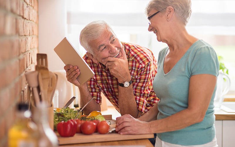 Senior couple spending time in the kitchen